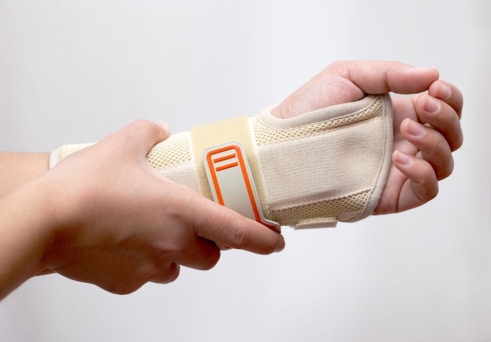 Individual wearing a wrist brace after an accident – symbolizing personal injury cases in Montana.
